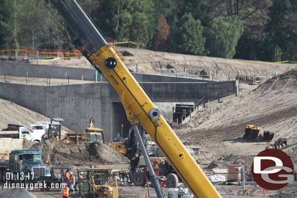 Behind the crane is the entrance tunnel from Fantasyland.