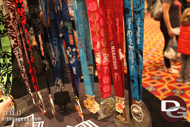 RunDisney medals on display.