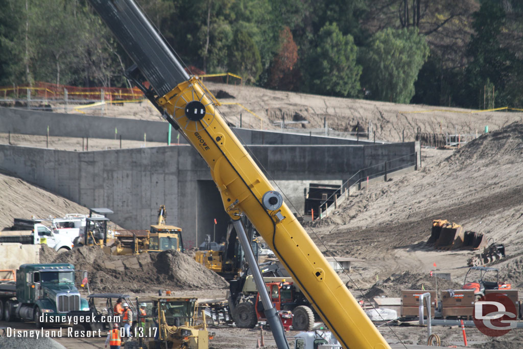 Behind the crane is the entrance tunnel from Fantasyland.