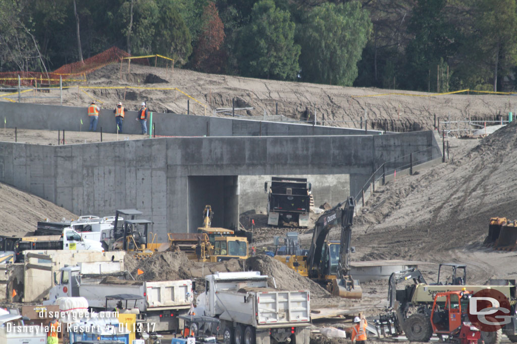 A closer look, notice the workers on the bridge.