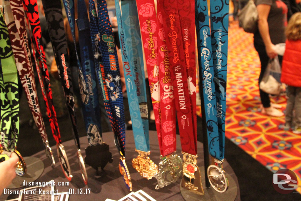 RunDisney medals on display.