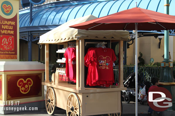 To the right of the entrance is a merchandise cart.