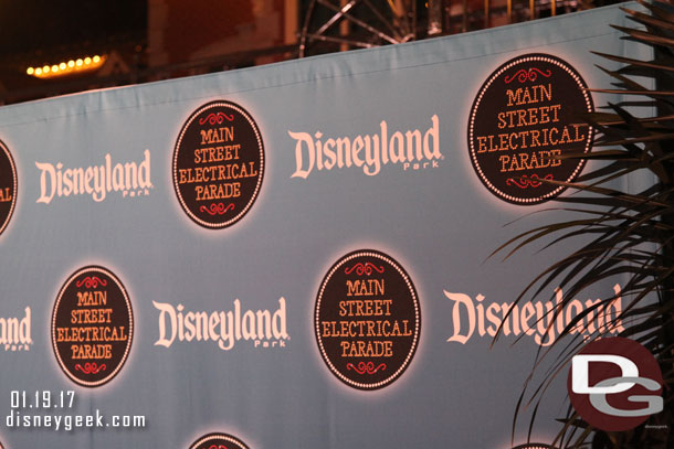 There was a photo backdrop set up near the train station for the party guests.  In a change with tradition the media were placed in front of the backdrop tonight to view the parade.