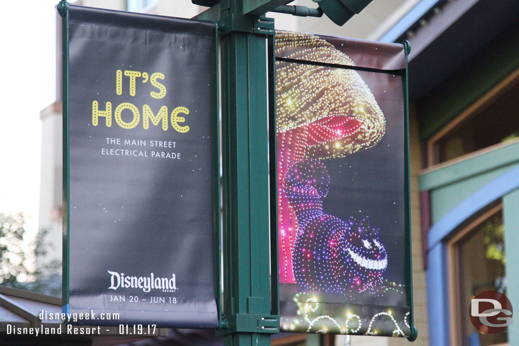 Main Street Electrical Parade banners line Downtown Disney.