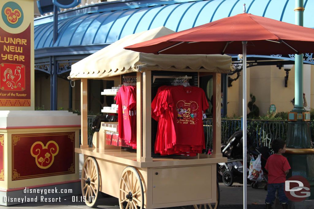 To the right of the entrance is a merchandise cart.