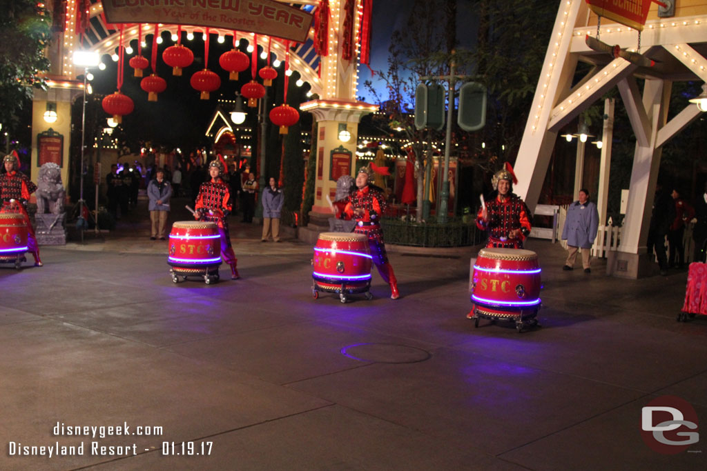 The procession heads down the parade route and only the drummers remain.