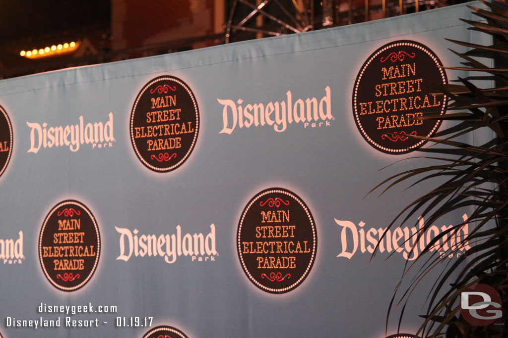 There was a photo backdrop set up near the train station for the party guests.  In a change with tradition the media were placed in front of the backdrop tonight to view the parade.