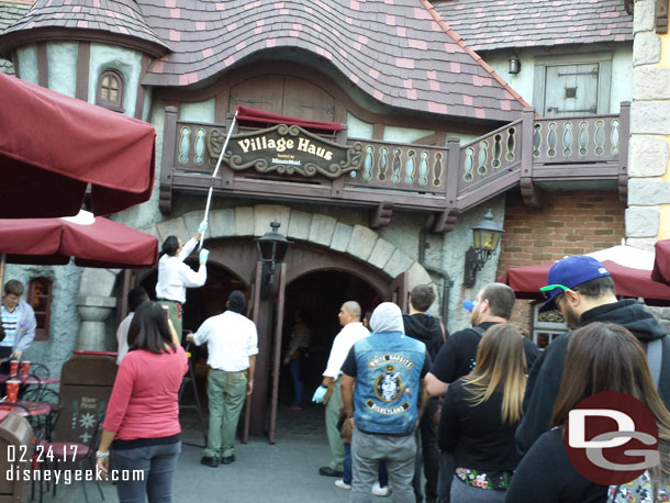 Something happened with the sign and cast members were working on it.