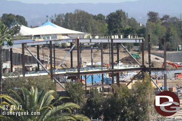 The large show building nearest the parking structure is continuing to grow.