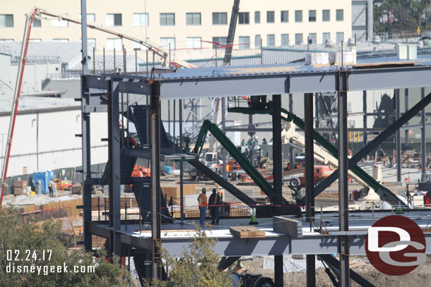 To get a feel for the size of the new building notice the workers and the flights of steps that are being installed.