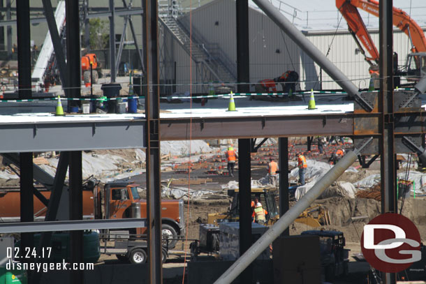 You can just barely make out the crew working on the foundation/ground floor of another building.