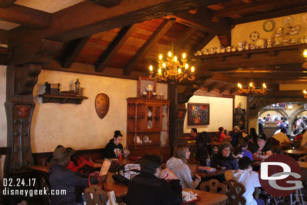 Inside props and new artwork have been added to change it from Pinocchio and his German Village Haus to Belle and France.