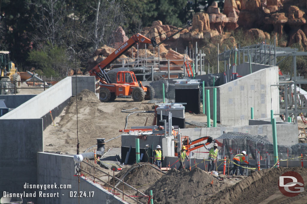 Dirt is being put on the roof of the marina structure.  Looks like quite a ways to go based on the black and the pipe/drain in the middle.