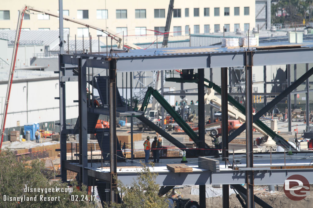 To get a feel for the size of the new building notice the workers and the flights of steps that are being installed.