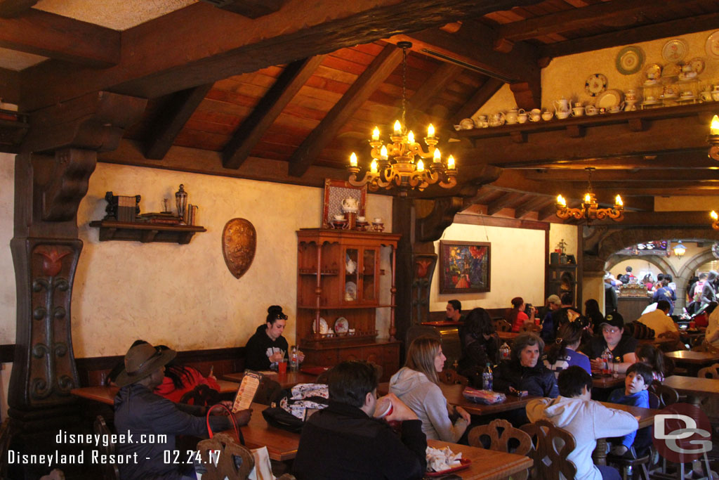 Inside props and new artwork have been added to change it from Pinocchio and his German Village Haus to Belle and France.