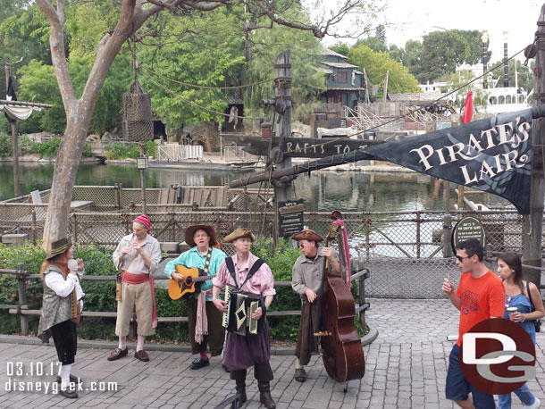 The Bootstrappers performing near the Rivers of America.