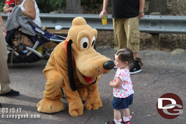 Pluto was out meeting guests.