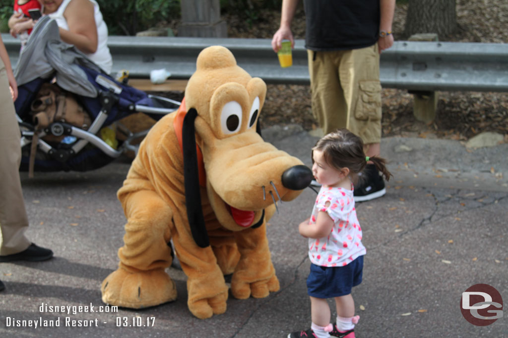 Pluto was out meeting guests.