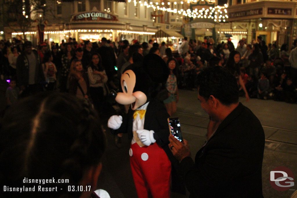 I thought this was great. Mickey, Minnie, and Pluto were working the crowd line. They were high fouring (fiving) guests and waving.