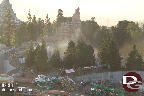 Smoke/dust rising from the Rivers of America work.  Could not tell if it was from the rock work or riverbed work.