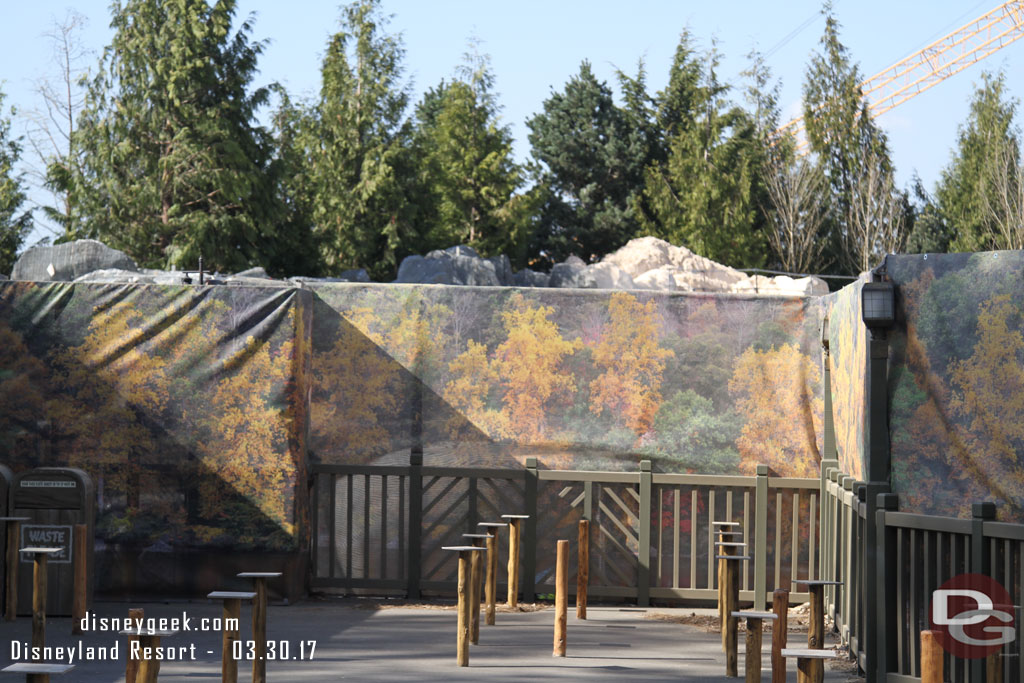 Rocks and trees visible beyond the patio of the Hungry Bear.