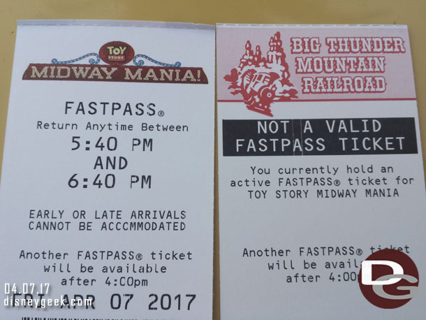 With the new Toy Story FastPass they have not integrated the parks into one system.  That means you can no longer have a FastPass at each park.  Here is what happened why I scanned my card at Big Thunder earlier.  It told me I had a Toy Story one.