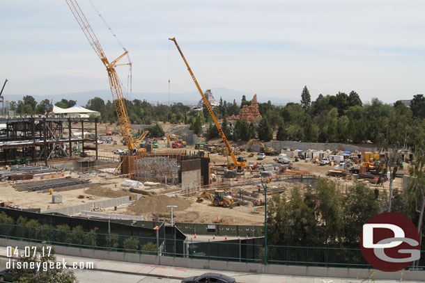 In the foreground more foundation work and walls going up for this side of the attraction.