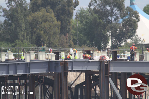 Crews working on the roof.  More steel i-beams were being lowered into position this afternoon.