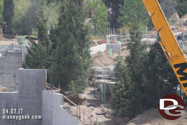 Trees are starting to be placed on the roof of the marina structure.  Also some rock work taking shape to hide the large pipe we saw last trip.