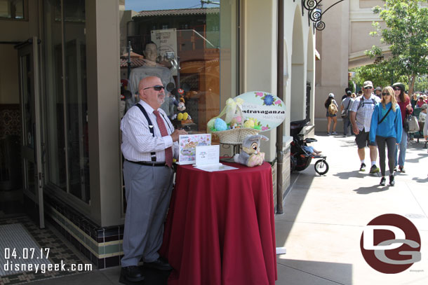 A Cast Member in front of the Five and Dime on Buena Vista Street showcasing the DCA Egg-Stravaganza