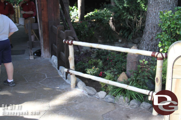 The rail and border have been replaced where the temporary walkway connected near the entrance to Winnie the Pooh