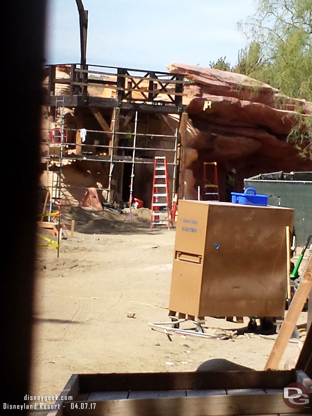 Looking through the fence.  Thought maybe we would see some forms for the walkway but not yet..