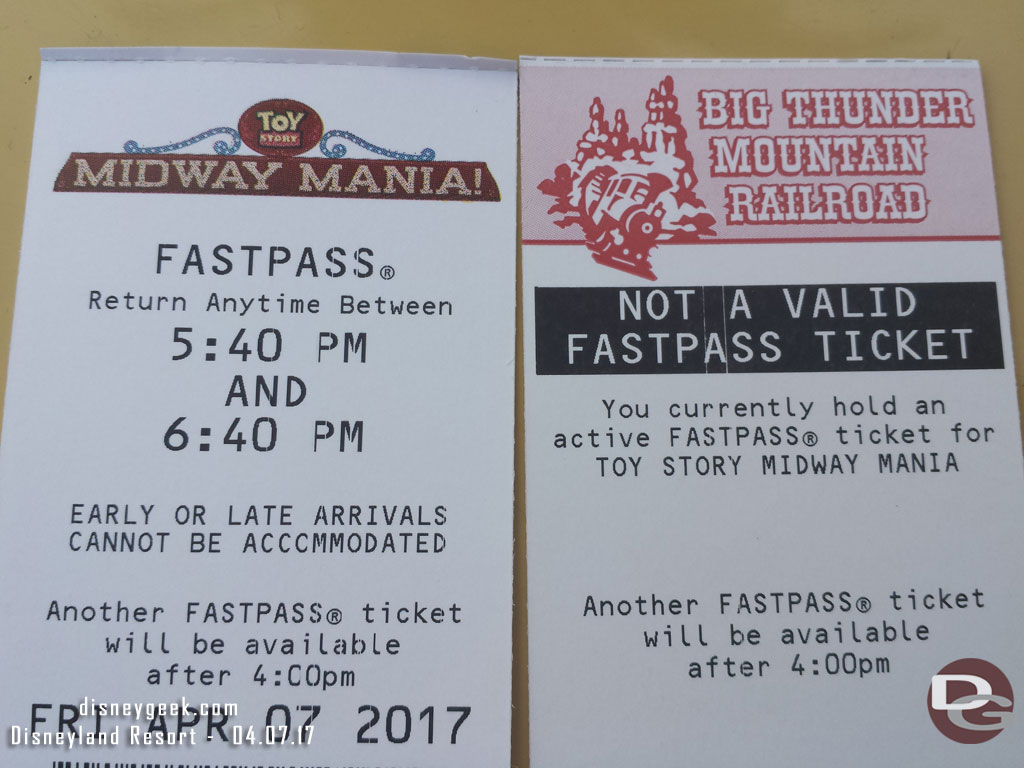 With the new Toy Story FastPass they have not integrated the parks into one system.  That means you can no longer have a FastPass at each park.  Here is what happened why I scanned my card at Big Thunder earlier.  It told me I had a Toy Story one.