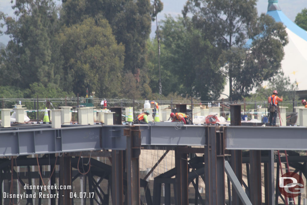 Crews working on the roof.  More steel i-beams were being lowered into position this afternoon.