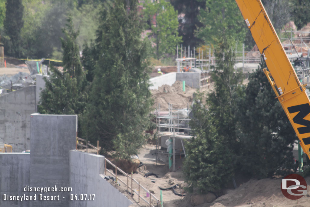 Trees are starting to be placed on the roof of the marina structure.  Also some rock work taking shape to hide the large pipe we saw last trip.