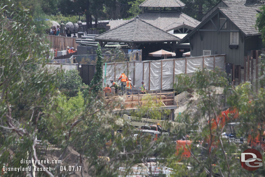 A crew is working on the new bridge.