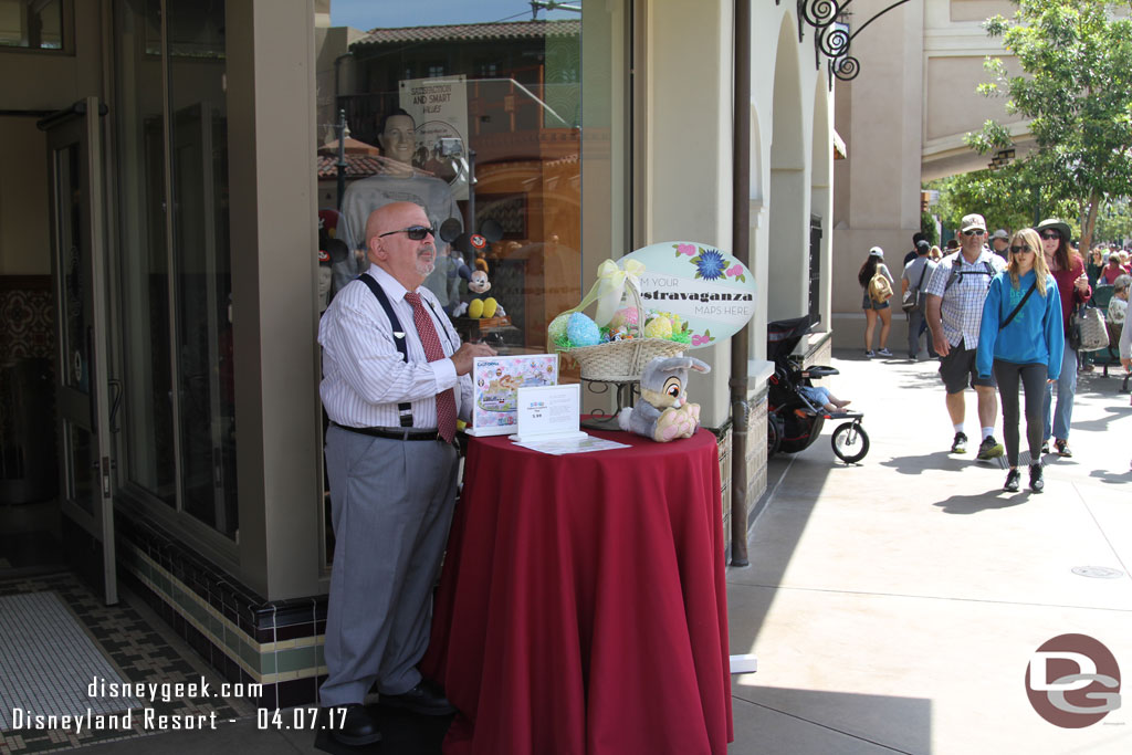 A Cast Member in front of the Five and Dime on Buena Vista Street showcasing the DCA Egg-Stravaganza