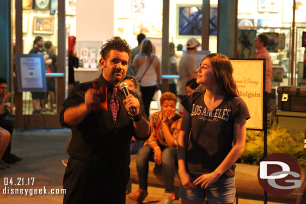 Magician James Holguin performing in Downtown Disney.