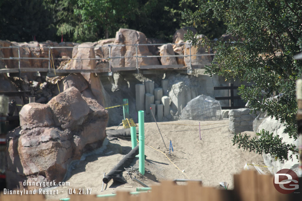 A closer look at the progress of the rock work along the Rivers of America.