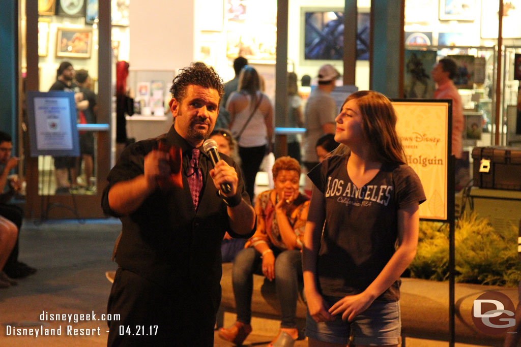 Magician James Holguin performing in Downtown Disney.