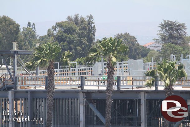 Work on the roof of the larger/closer show building.