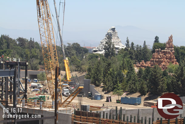 Work continues near the entrance tunnels.  They were lifting rocks over the berm for installation.