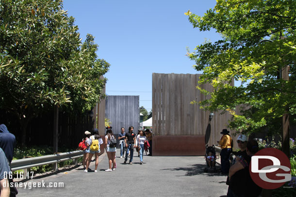 Grad Nite guests entering through the backstage gate.  There is a bus drop off and security screening set up to funnel them in this way.