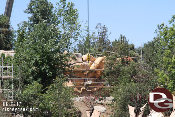 The rock was being placed near the train path.