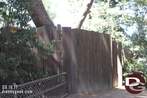 The fence leading to the far north of the island.  A new structure is being built behind it.  