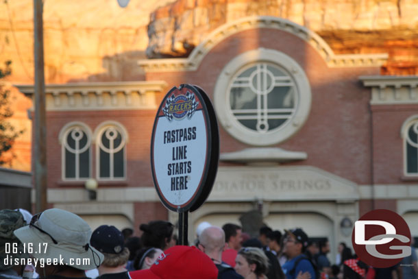 The end of the FastPass return line for Racers was at Cross Street.