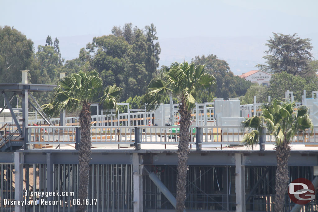 Work on the roof of the larger/closer show building.