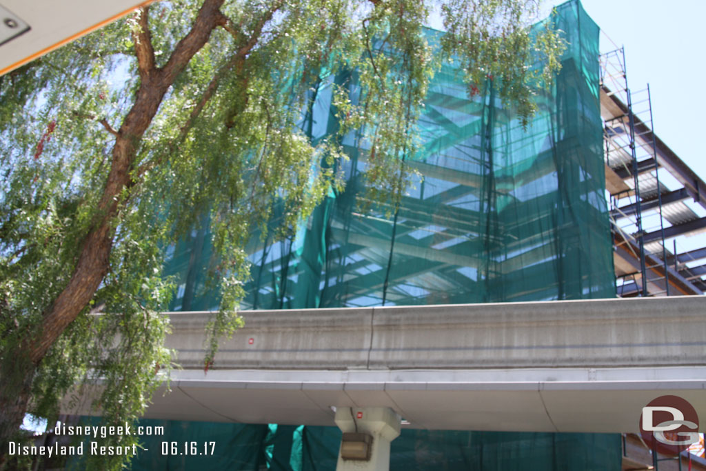 Splitsville work from the tram.  The building comes right up to the Monorail beam.