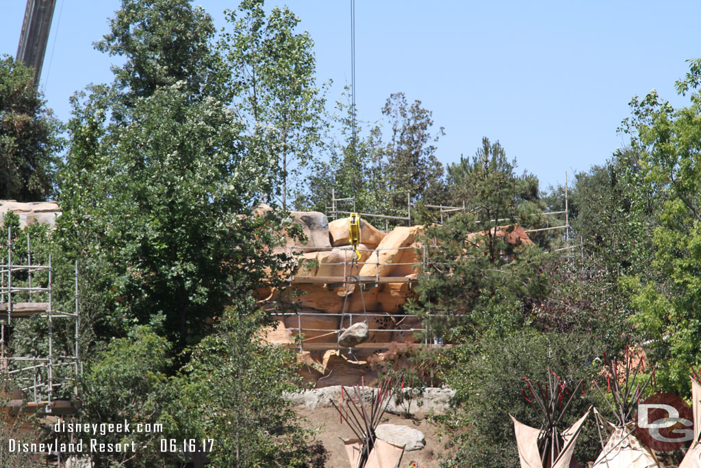 The rock was being placed near the train path.