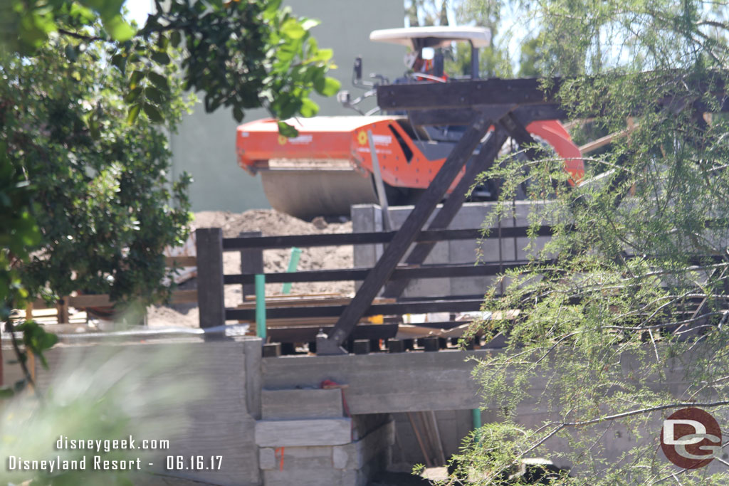 A closer look.  you can see the equipment we saw from the structure working on the berm.  Assuming they are preparing it for more trees to block out the structure.